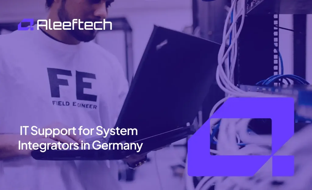 IT support technician working on a laptop in a server room in Germany