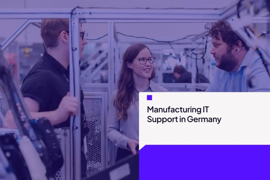 Manufacturing IT support in Germany: engineers collaborating on factory floor.
