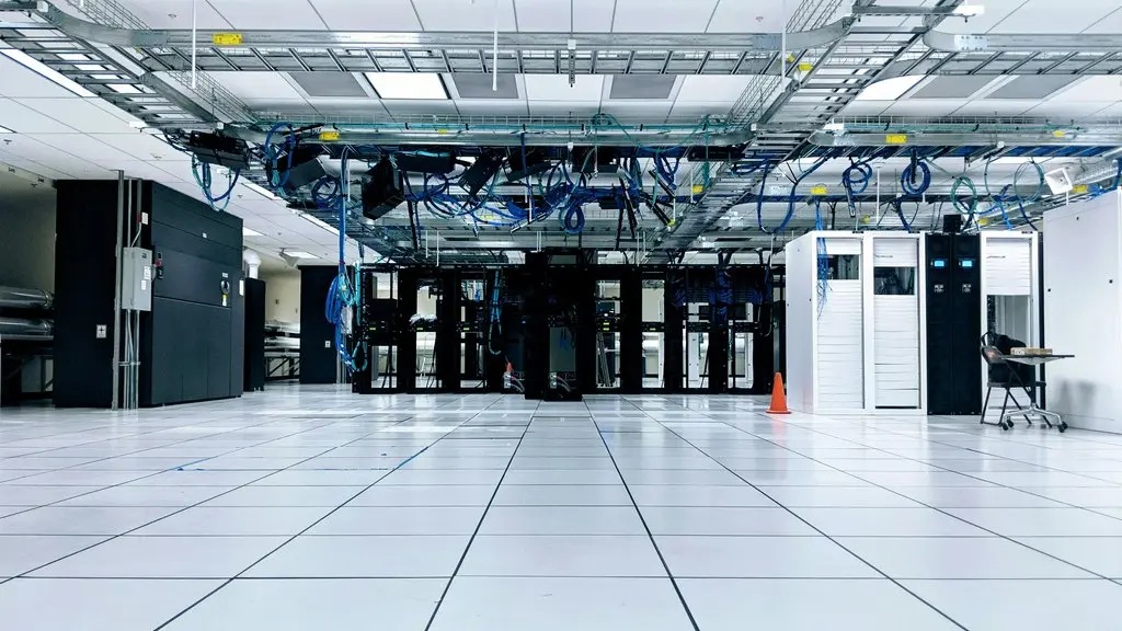 Modern data center with server racks and extensive cabling